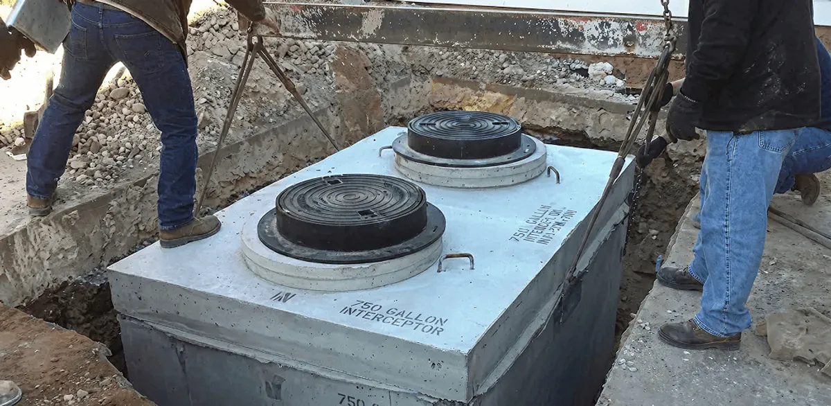 Grease trap installation for a commercial property drainage system in Atlanta, GA